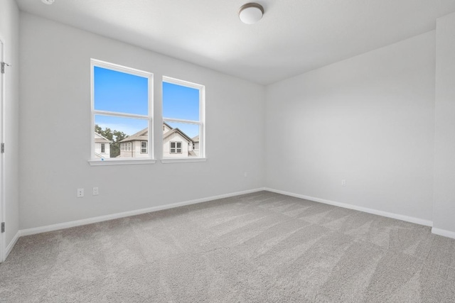 320 Creek Rd Unit 202, Dripping Springs, TX 78620 - spare room featuring carpet and baseboards