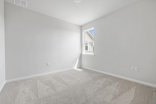 320 Creek Rd Unit 202, Dripping Springs, TX 78620 - spare room with carpet flooring and baseboards
