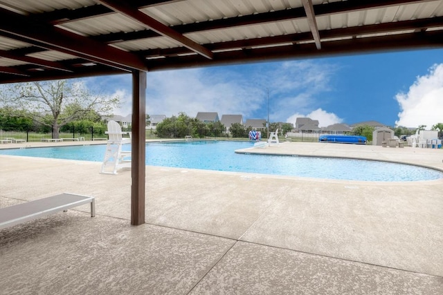 320 Creek Rd Unit 202, Dripping Springs, TX 78620 - community pool featuring a patio and fence