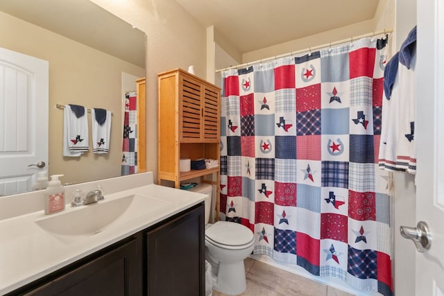 447 Discovery Dr, Kyle, TX 78640 - bathroom featuring vanity, tile patterned floors, and a shower with shower curtain
