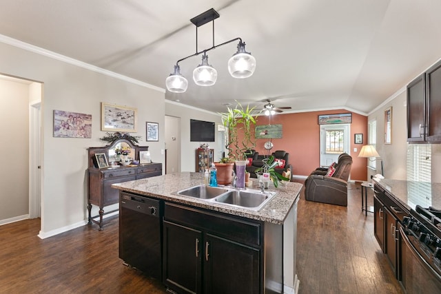 447 Discovery Dr, Kyle, TX 78640 - kitchen featuring black appliances, a center island with sink, dark wood-style floors, ornamental molding, and ceiling fan