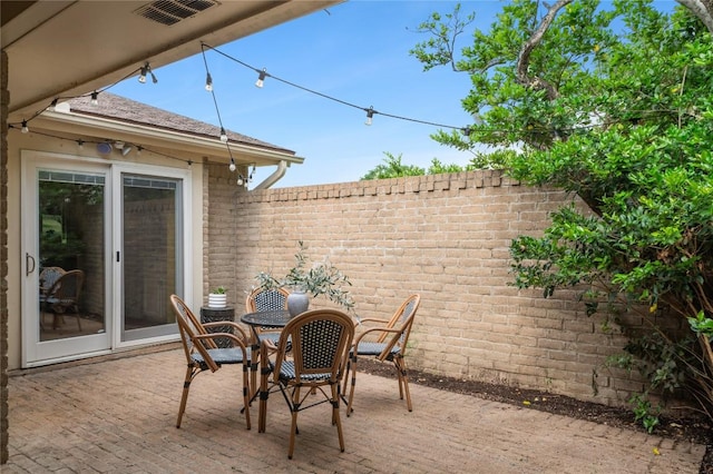 view of patio / terrace with fence and outdoor dining space