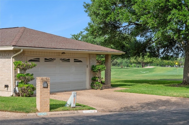 garage featuring driveway