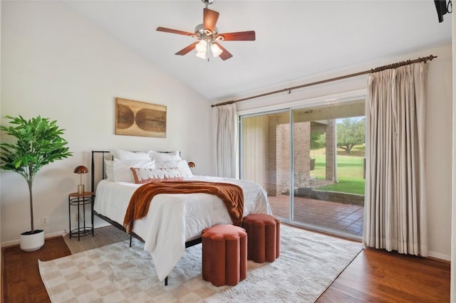 bedroom featuring high vaulted ceiling, access to exterior, a ceiling fan, baseboards, and wood finished floors