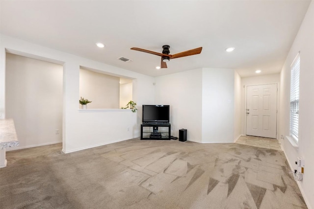 unfurnished living room with visible vents, a ceiling fan, carpet flooring, and recessed lighting