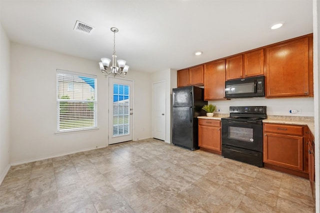 kitchen with a chandelier, brown cabinetry, black appliances, and light countertops