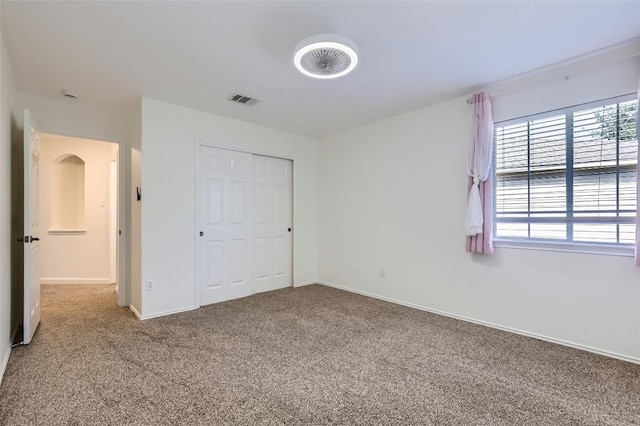 14308 Homestead Village Cir, Austin, TX 78717 - unfurnished bedroom featuring carpet floors and a closet