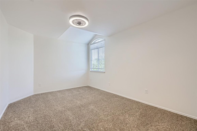 14308 Homestead Village Cir, Austin, TX 78717 - carpeted empty room with vaulted ceiling and baseboards