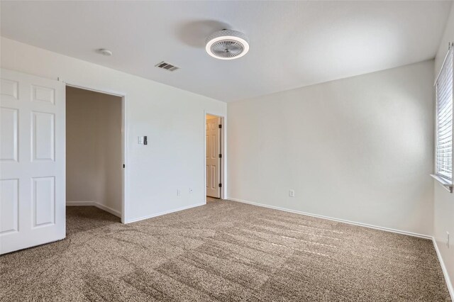 14308 Homestead Village Cir, Austin, TX 78717 - unfurnished bedroom with carpet floors and baseboards
