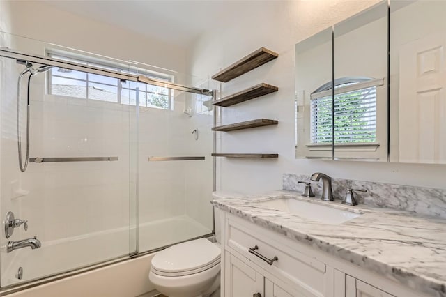 14308 Homestead Village Cir, Austin, TX 78717 - full bath with plenty of natural light, toilet, vanity, and bath / shower combo with glass door