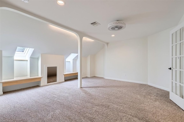 14308 Homestead Village Cir, Austin, TX 78717 - bonus room with carpet, a skylight, vaulted ceiling, recessed lighting, and baseboards