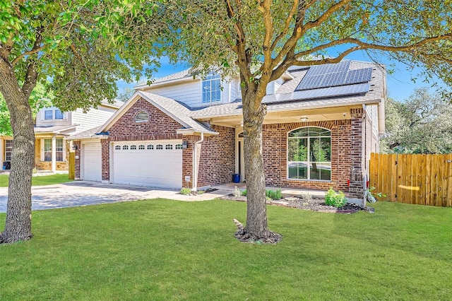 14308 Homestead Village Cir, Austin, TX 78717 - traditional-style home with an attached garage, solar panels, brick siding, concrete driveway, and a shingled roof