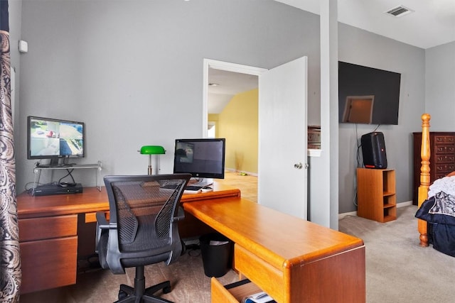 home office featuring visible vents and carpet floors