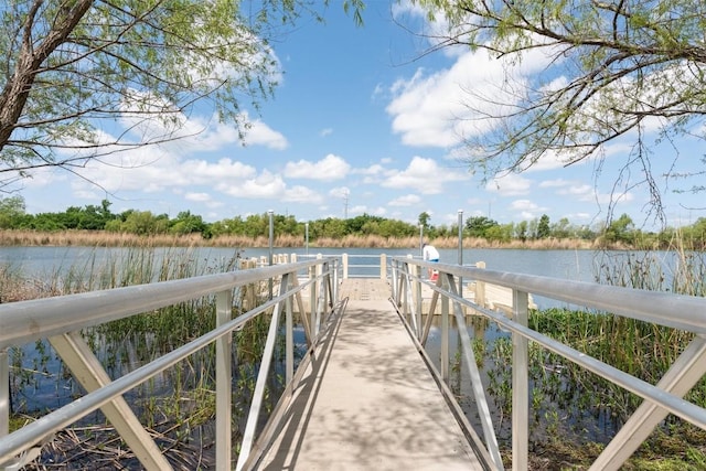 view of dock with a water view