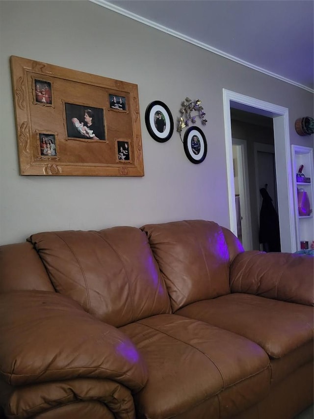 1403 Wallace St, Taylor, TX 76574 - living area featuring ornamental molding