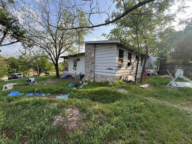 11014 W Lake Terrace Dr, Jonestown, TX 78645 - view of home's exterior featuring central AC unit