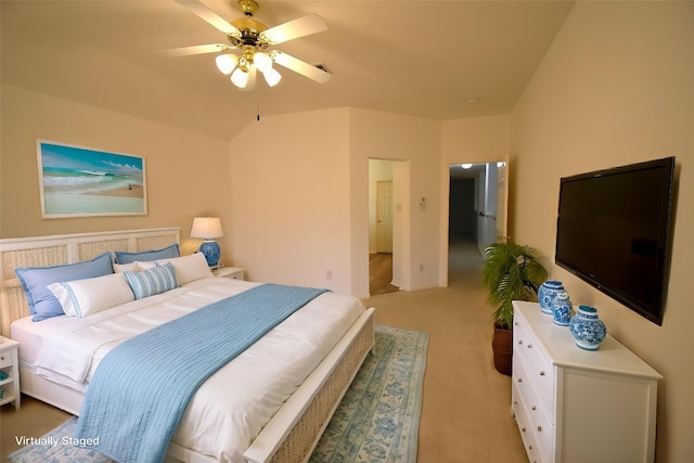 bedroom featuring ceiling fan and light carpet