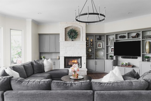 living room with crown molding, dark wood-style floors, and a fireplace