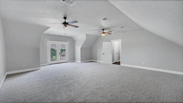 725 Winding Vw, New Braunfels, TX 78132 - bonus room with visible vents, ceiling fan, lofted ceiling, and carpet floors