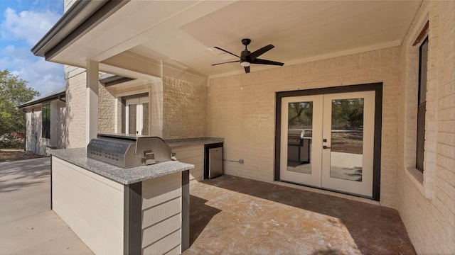 725 Winding Vw, New Braunfels, TX 78132 - view of patio featuring french doors, ceiling fan, area for grilling, and exterior kitchen