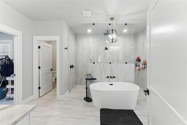 725 Winding Vw, New Braunfels, TX 78132 - full bath featuring a walk in shower, a soaking tub, and marble finish floor
