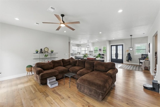 725 Winding Vw, New Braunfels, TX 78132 - living area featuring visible vents, a ceiling fan, light wood-type flooring, and recessed lighting