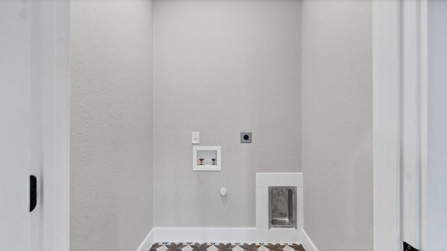 725 Winding Vw, New Braunfels, TX 78132 - laundry room with hookup for a washing machine, electric dryer hookup, laundry area, and baseboards