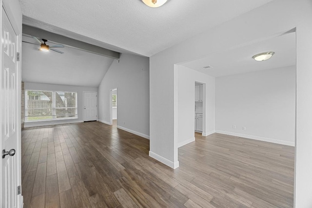 12808 Silver Creek Dr, Austin, TX 78727 - spare room featuring ceiling fan, wood finished floors, and a textured ceiling