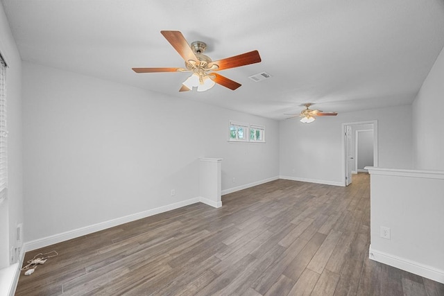 12808 Silver Creek Dr, Austin, TX 78727 - spare room featuring ceiling fan and wood finished floors