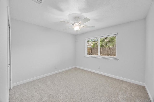 12808 Silver Creek Dr, Austin, TX 78727 - unfurnished room with light carpet and ceiling fan