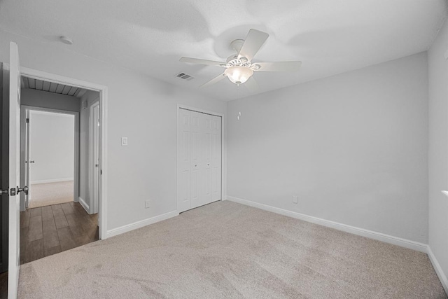 12808 Silver Creek Dr, Austin, TX 78727 - unfurnished bedroom with carpet floors, a closet, and ceiling fan
