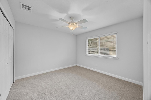 12808 Silver Creek Dr, Austin, TX 78727 - unfurnished bedroom with a closet, carpet flooring, and a ceiling fan