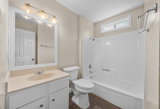 12808 Silver Creek Dr, Austin, TX 78727 - full bathroom with vanity,  shower combination, and wood finished floors