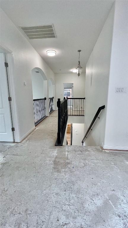 313 El Socorro Ln, Austin, TX 78732 - stairs with concrete floors