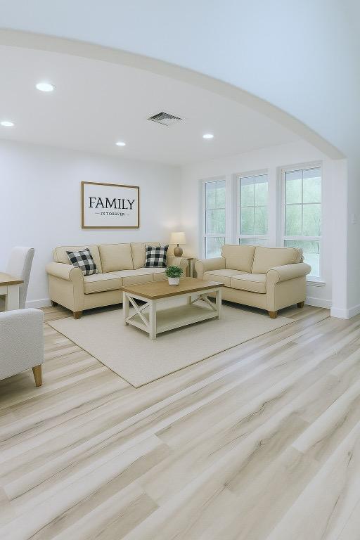 313 El Socorro Ln, Austin, TX 78732 - living area featuring recessed lighting and wood finished floors