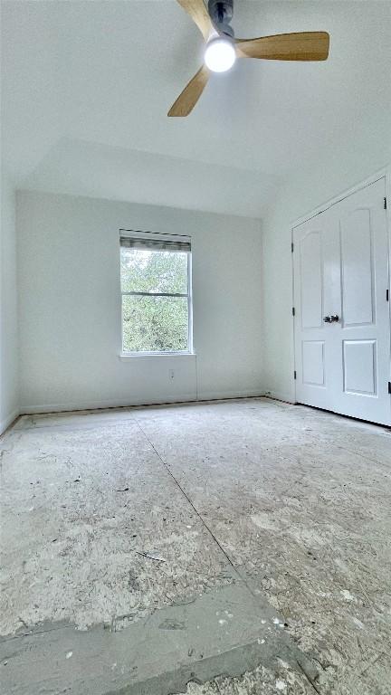 313 El Socorro Ln, Austin, TX 78732 - unfurnished bedroom featuring ceiling fan