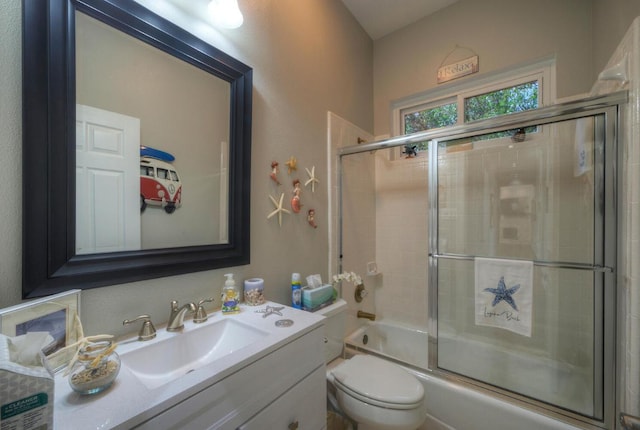 106 Clubhouse Dr, Lakeway, TX 78734 - bathroom with vanity and shower / bath combination with glass door