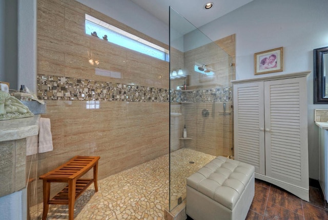 full bathroom featuring recessed lighting, a walk in shower, and wood finished floors