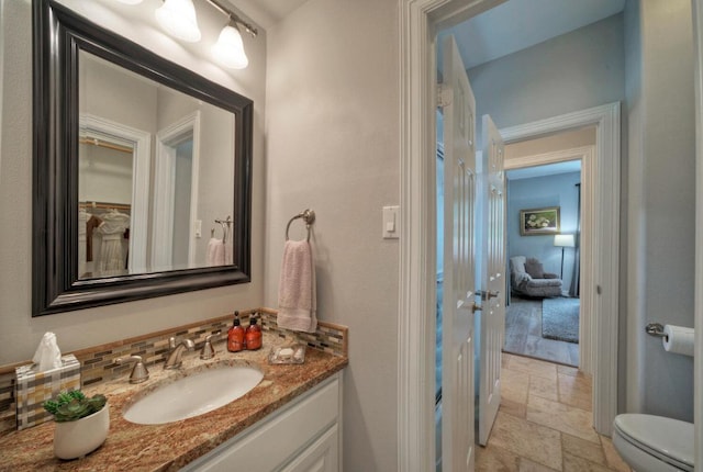 106 Clubhouse Dr, Lakeway, TX 78734 - bathroom with stone tile floors and vanity
