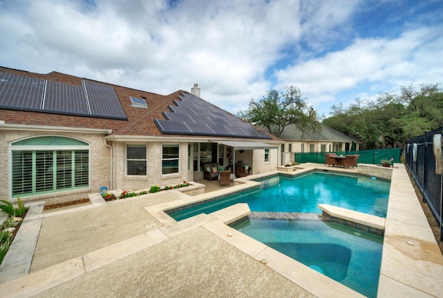 106 Clubhouse Dr, Lakeway, TX 78734 - view of swimming pool featuring a fenced backyard, a patio area, outdoor dining space, and a pool with connected hot tub