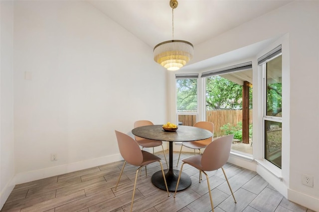 7310 Broken Arrow Ln, Austin, TX 78745 - dining space featuring wood tiled floor and baseboards