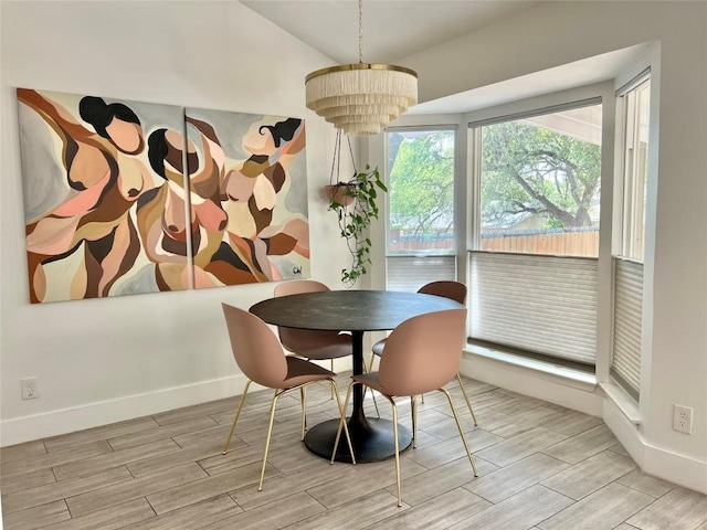 7310 Broken Arrow Ln, Austin, TX 78745 - dining space with baseboards and wood finished floors