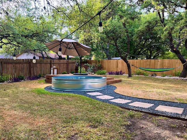7310 Broken Arrow Ln, Austin, TX 78745 - view of yard with a fenced backyard