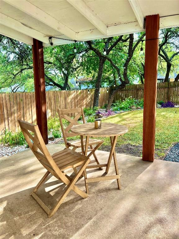 7310 Broken Arrow Ln, Austin, TX 78745 - view of patio / terrace with outdoor dining space and a fenced backyard