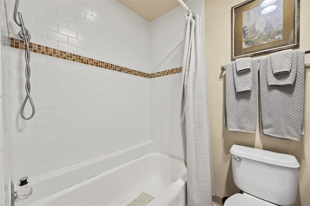 7685 Northcross Dr Unit 304, Austin, TX 78757 - bathroom featuring shower / tub combo and toilet