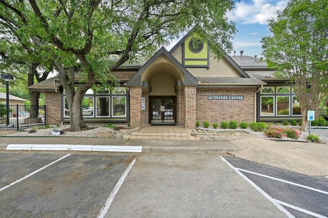 7685 Northcross Dr Unit 304, Austin, TX 78757 - view of property featuring uncovered parking