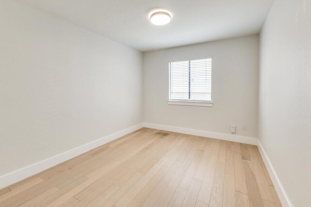 7901 Keswick Dr, Austin, TX 78745 - empty room featuring light wood finished floors and baseboards