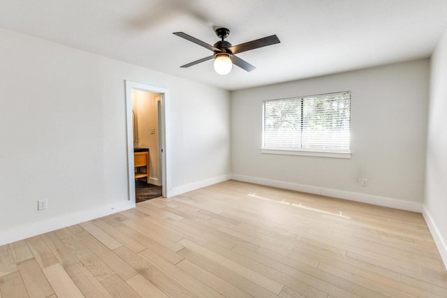 7901 Keswick Dr, Austin, TX 78745 - empty room with ceiling fan, light wood-type flooring, and baseboards