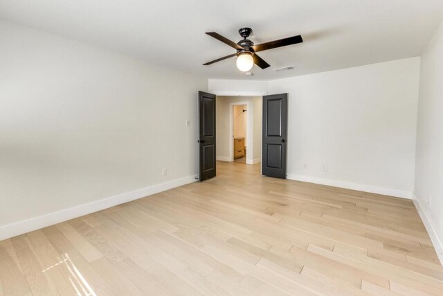 7901 Keswick Dr, Austin, TX 78745 - empty room featuring ceiling fan and light wood-type flooring