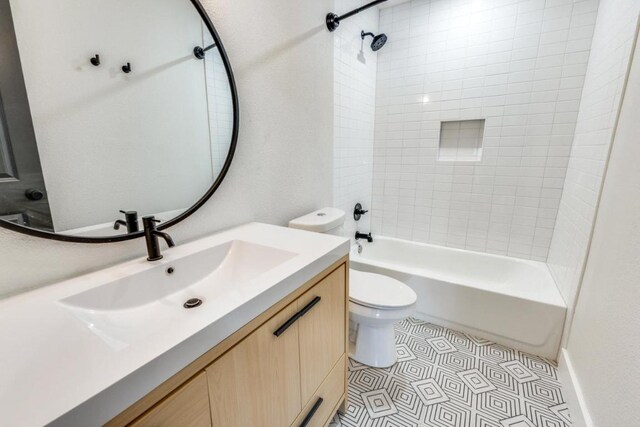 7901 Keswick Dr, Austin, TX 78745 - bathroom featuring vanity and  shower combination